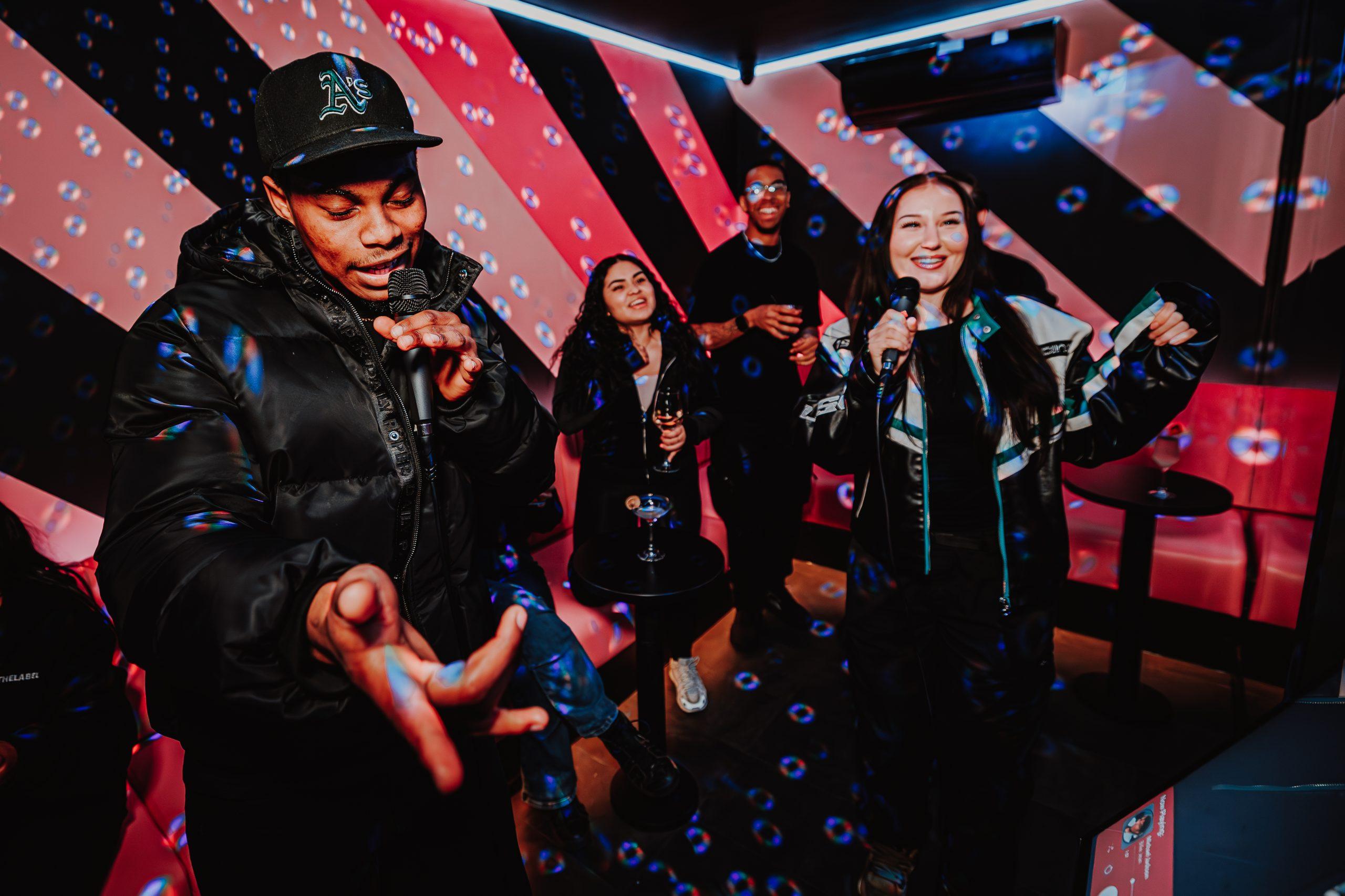 A group of customers enjoying Karaoke at Playbox in Croydon