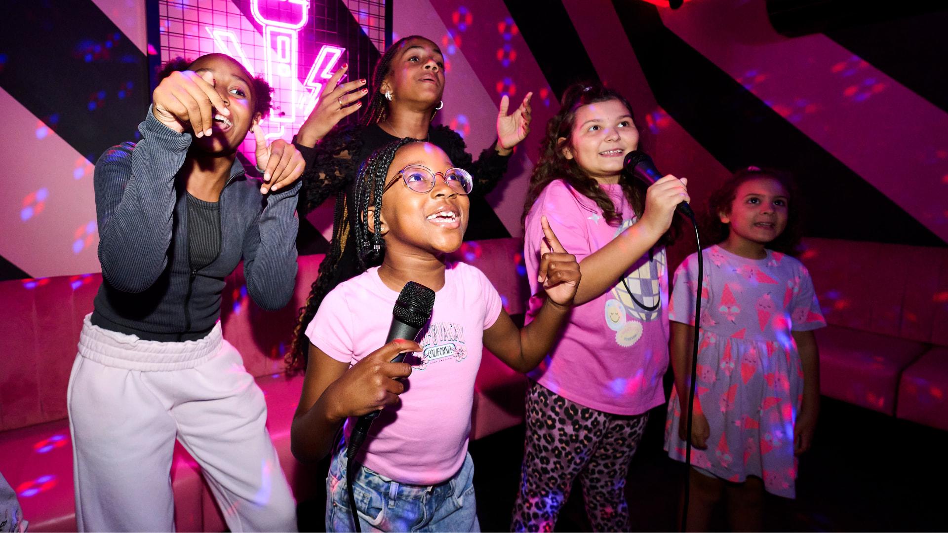 Children enjoying Karaoke at PLAYBOX in Croydon
