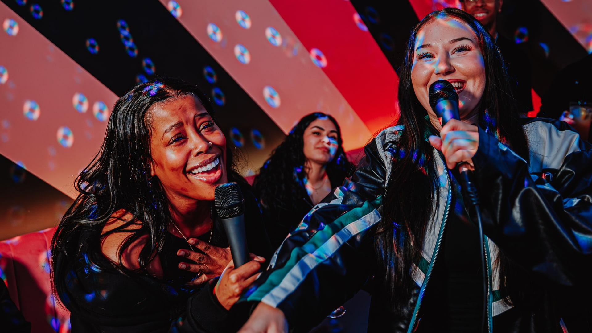 A group of customers enjoying Karaoke at Playbox in Croydon
