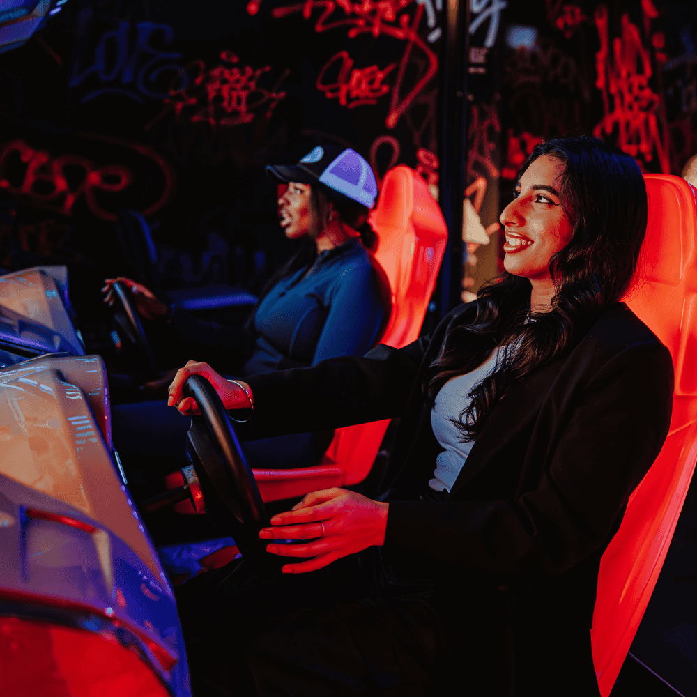 Customers playing Mario Kart at PLAYBOX in Croydon