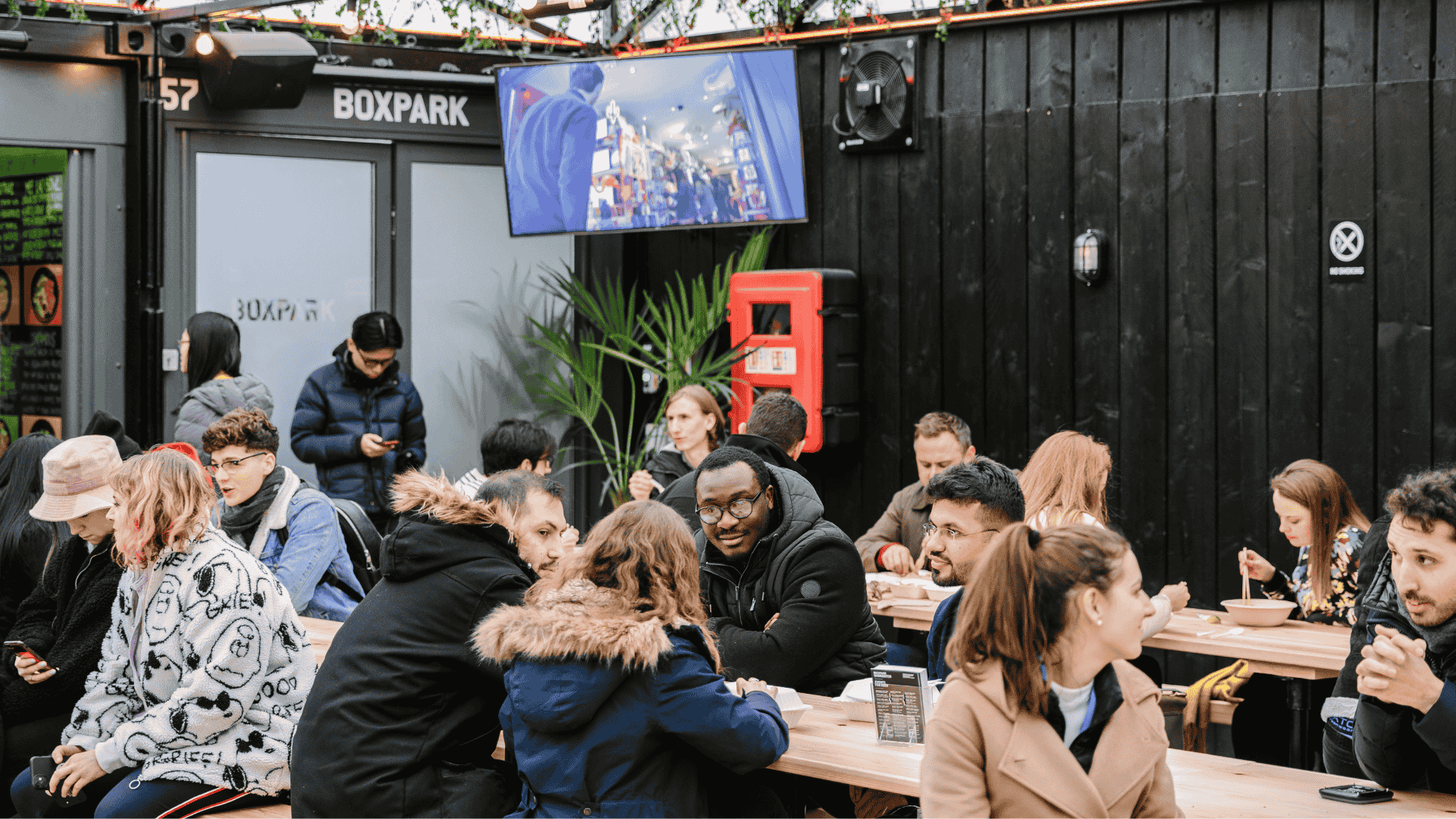 Guests eating at Boxpark