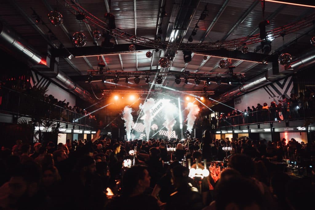 Guests dancing at BOXPARK during an event