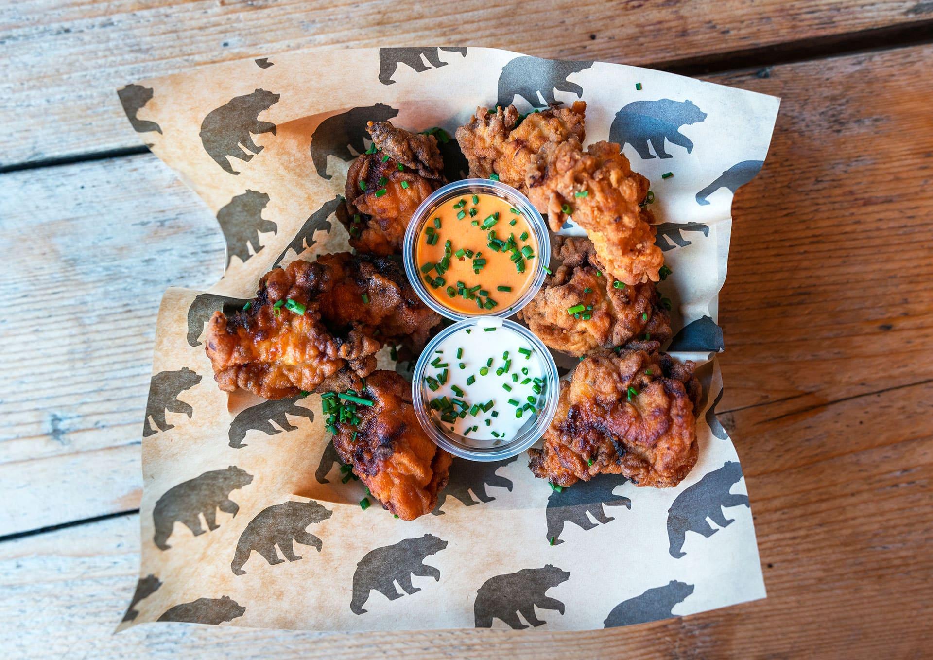 Wings and sauce from Black Bear Burger at BOXPARK Camden