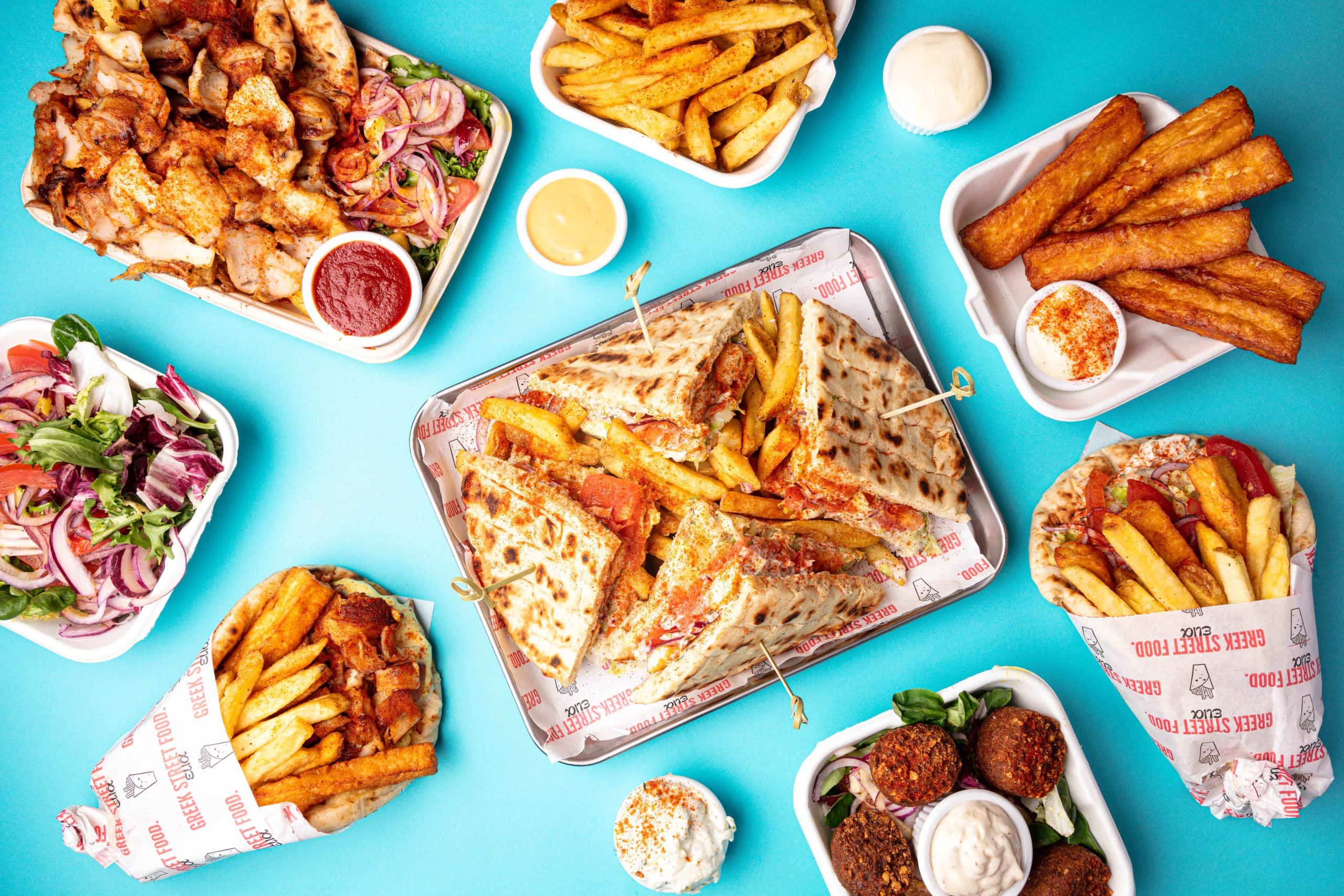 A selection of food from Elia Greek Street Food at BOXPARK Camden
