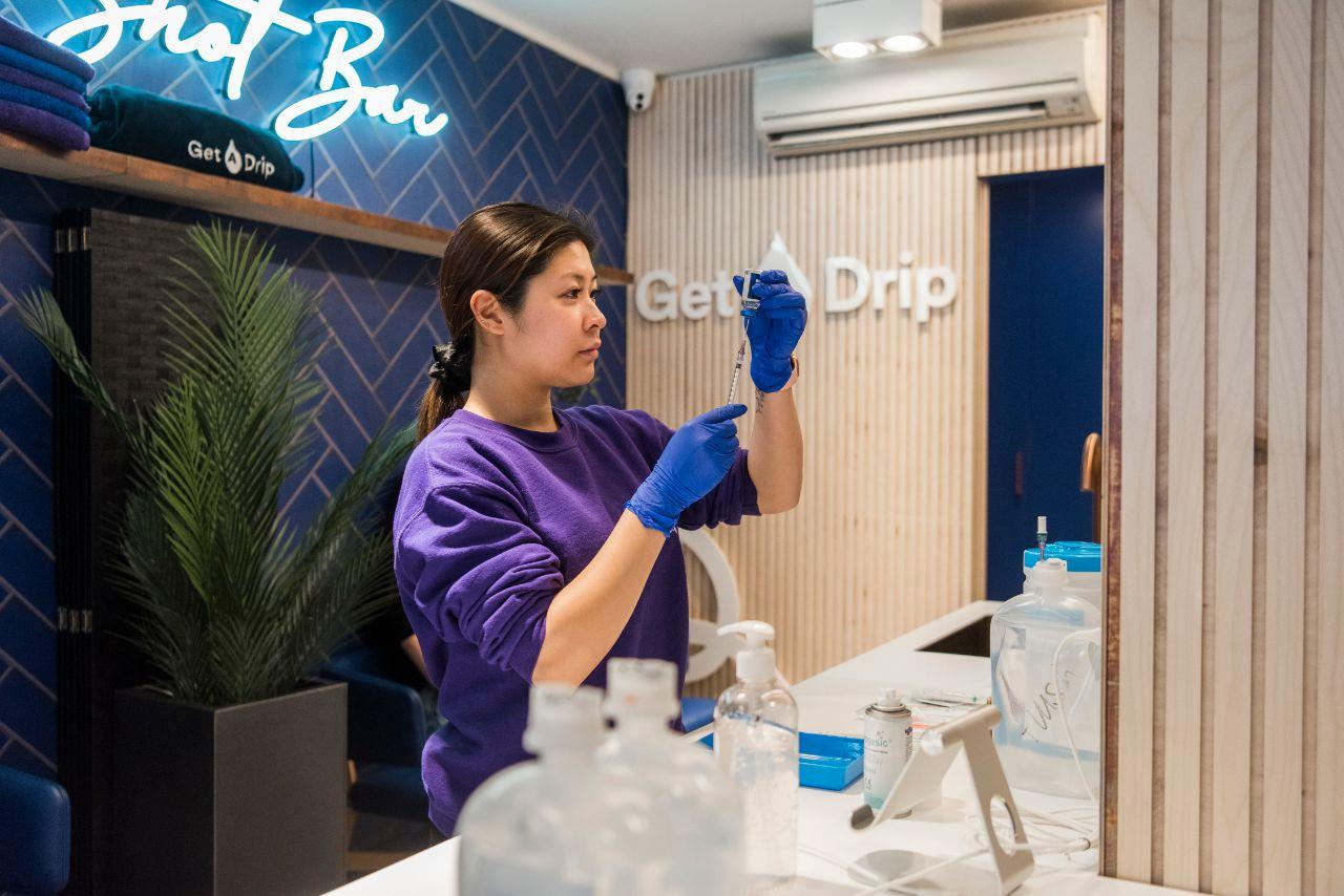 Nurse preparing a drip in Shoreditch