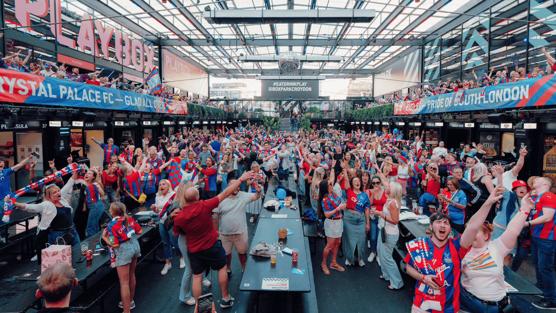 Guests watching Crystal Palace at Boxpark Croydon