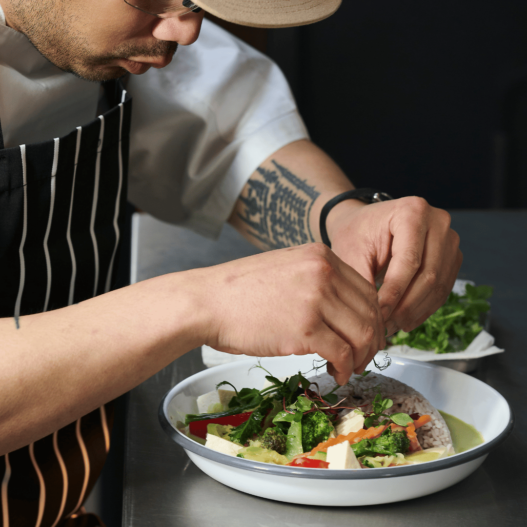 chef adding finishing touches