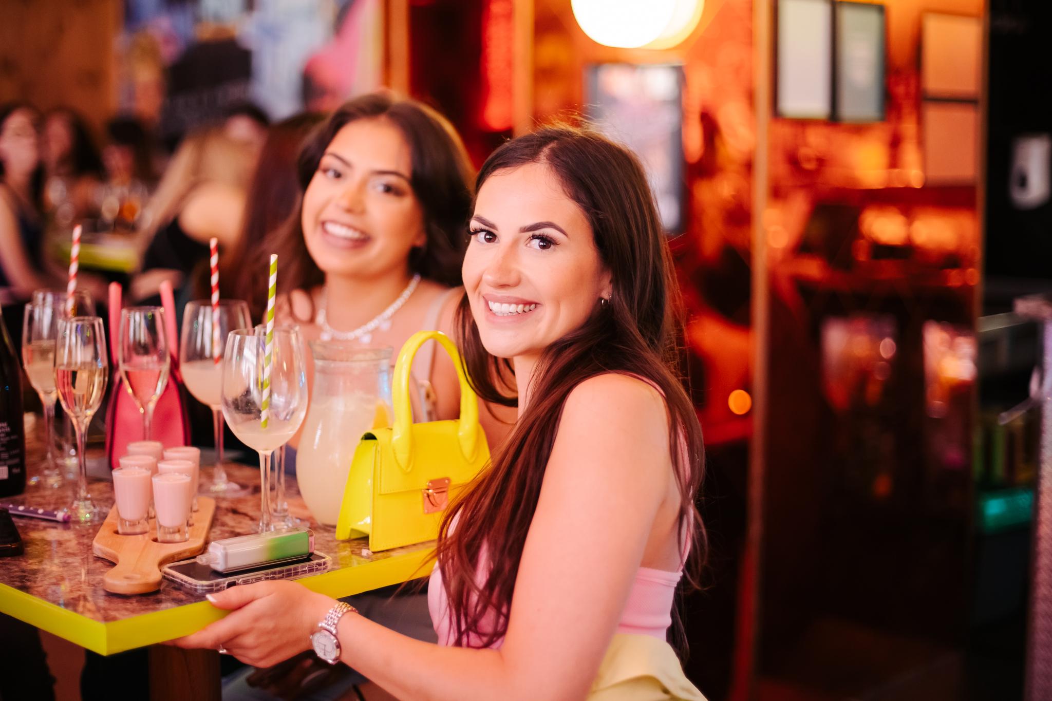 Girls Enjoying Drinks at Nikki's Bar
