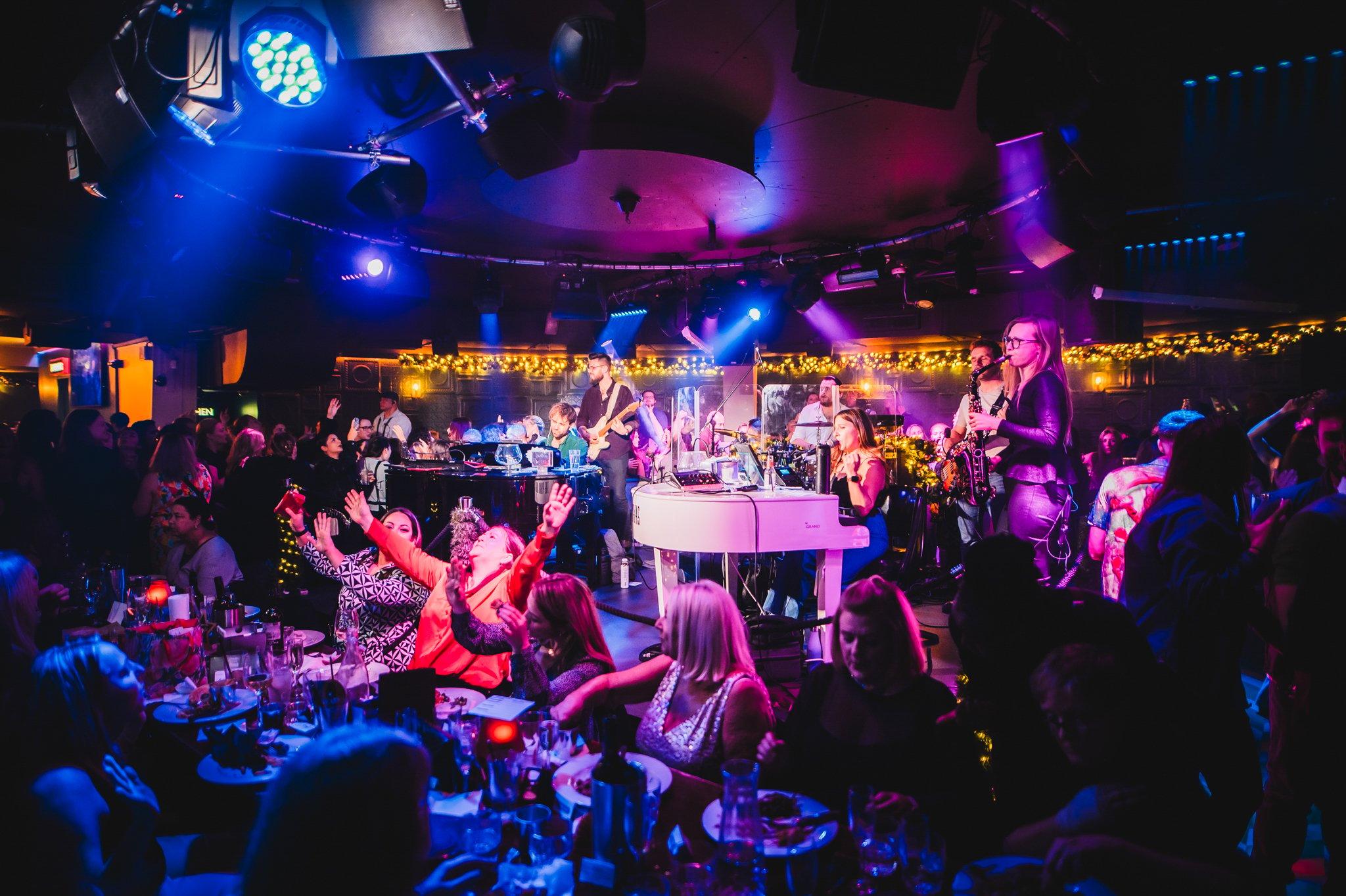 Customers dancing at The Piano Works in Covent Garden 