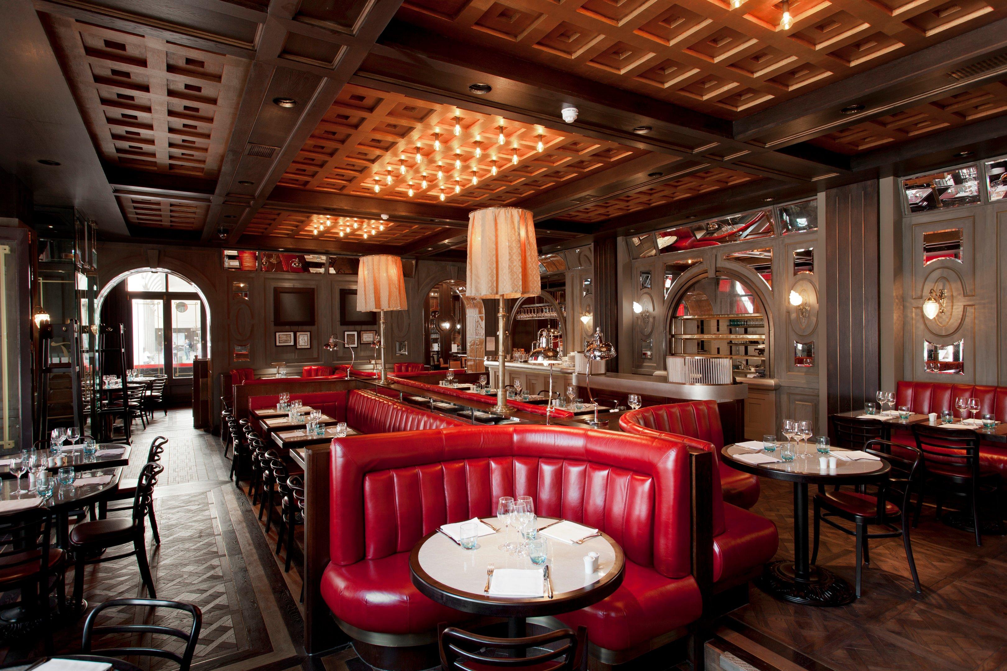 Red leather booth seating in Tuttons in Covent Garden