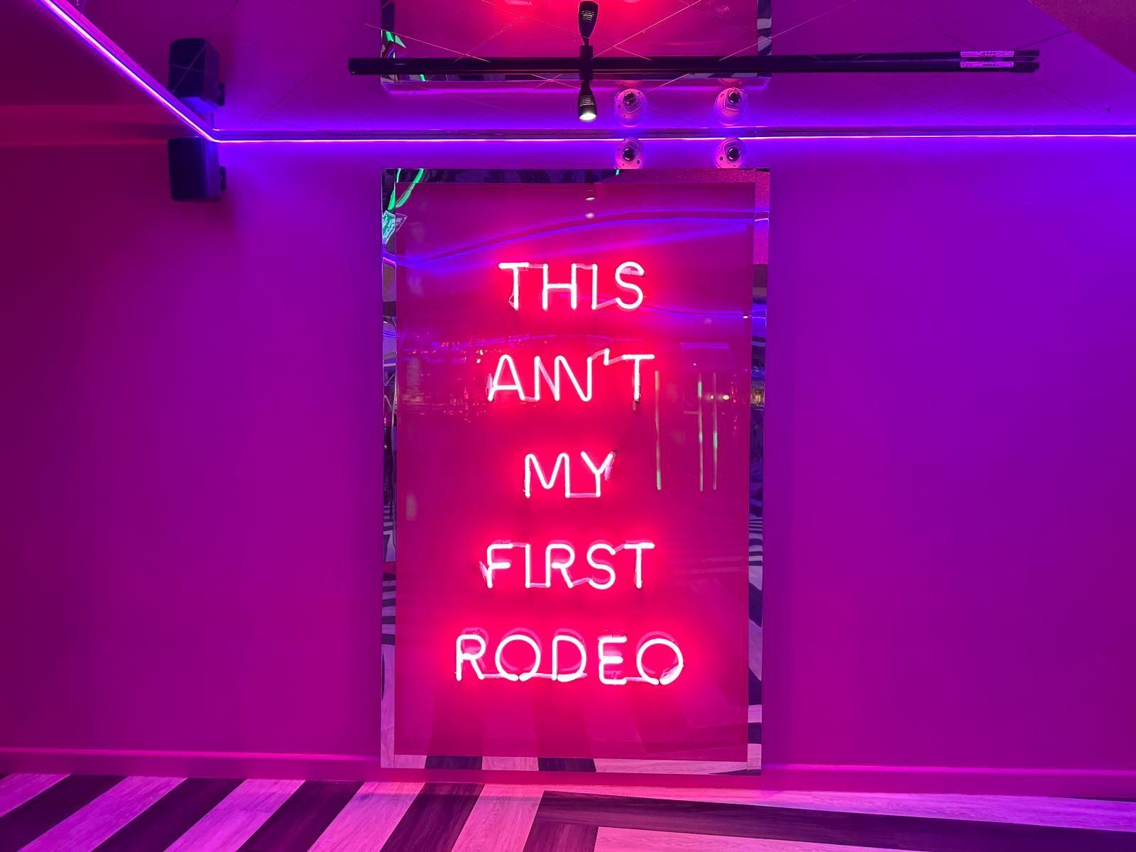 This Ain't My First Rodeo pink neon sign