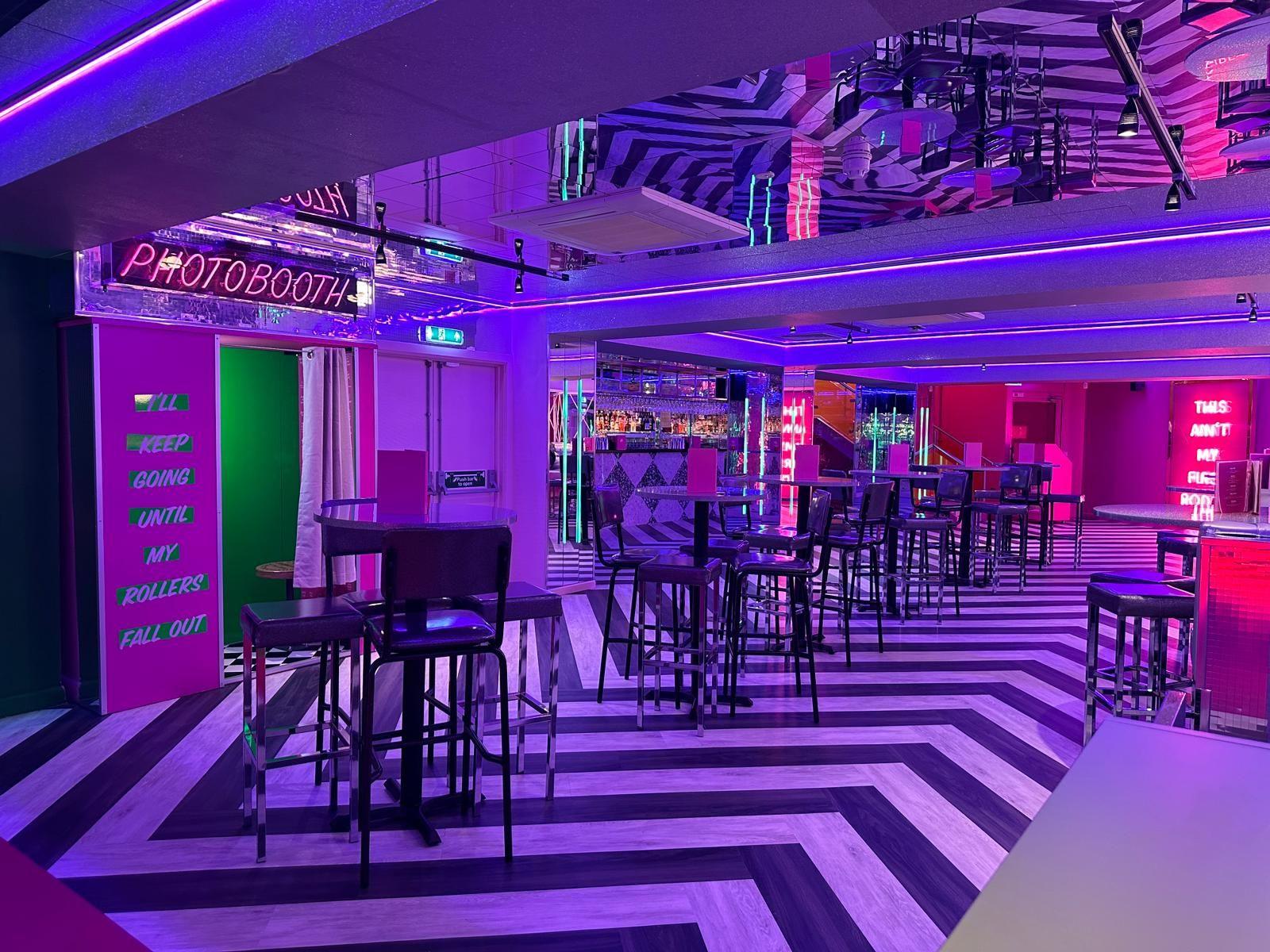 Interior shot of Tonight Josephine Liverpool with black and white flooring and seating