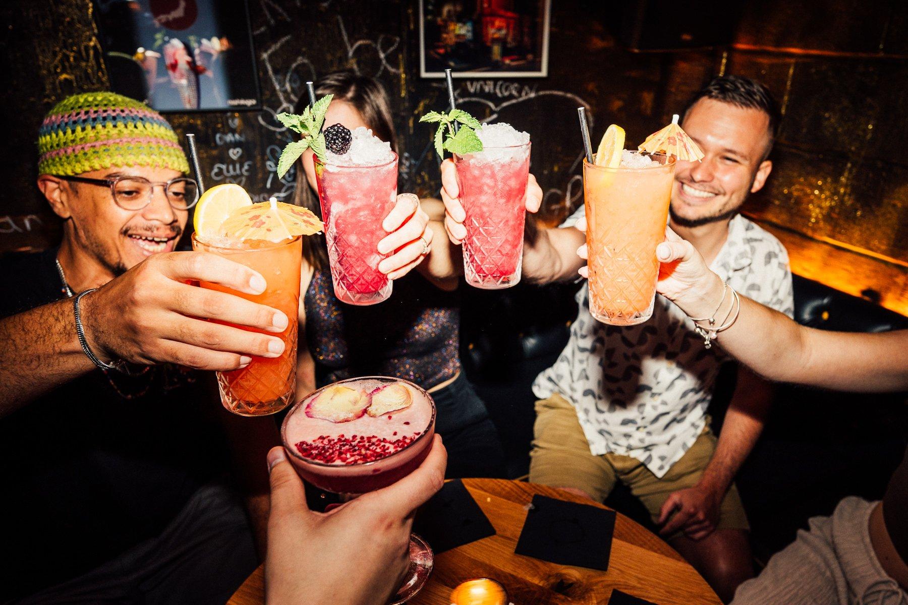 Customers cheers cocktails at The Cocktail Club