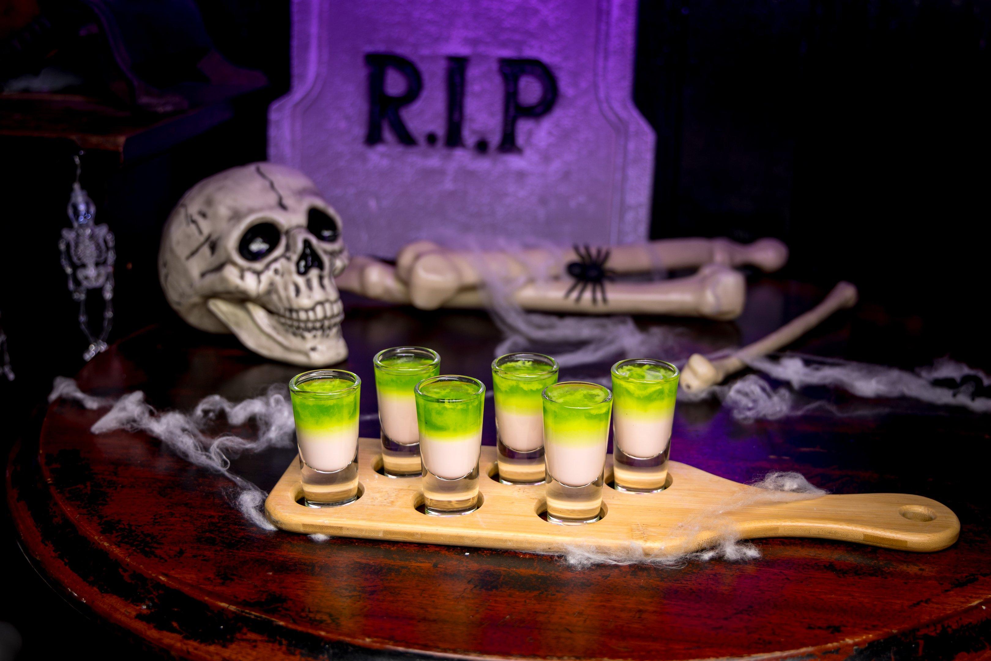 A shot paddle with six Halloween Beetlejuice shots 