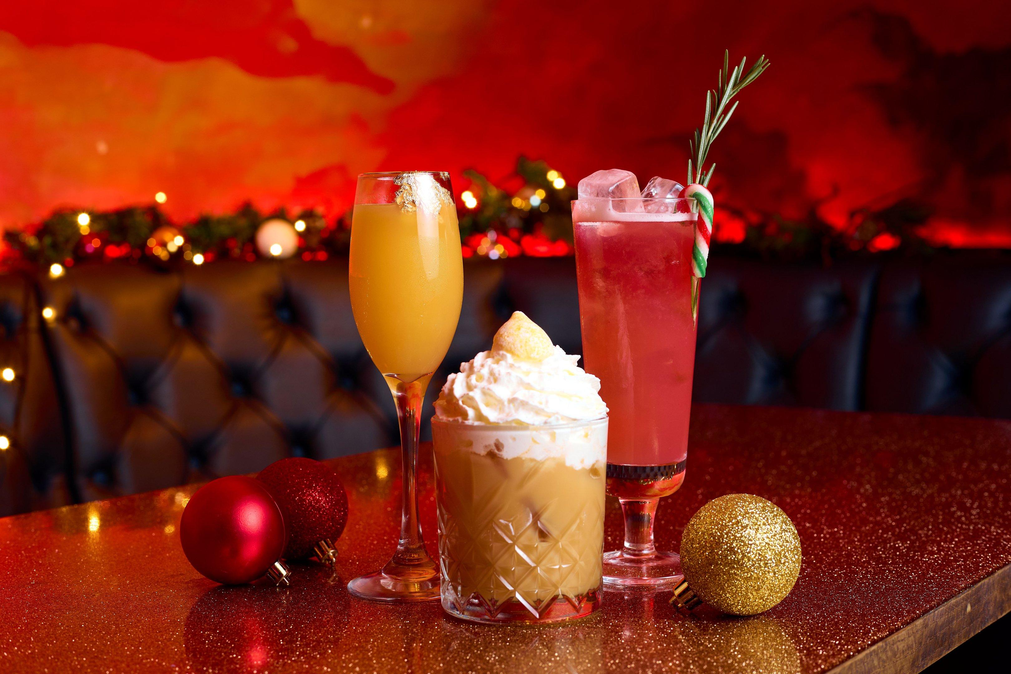 Three Christmas cocktails on a table in The Escapologist bar