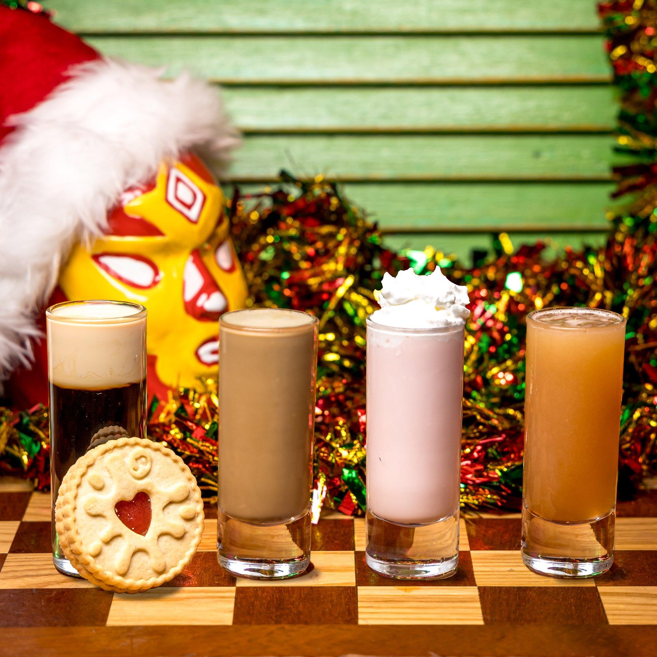 Four festive shots lined up on a table