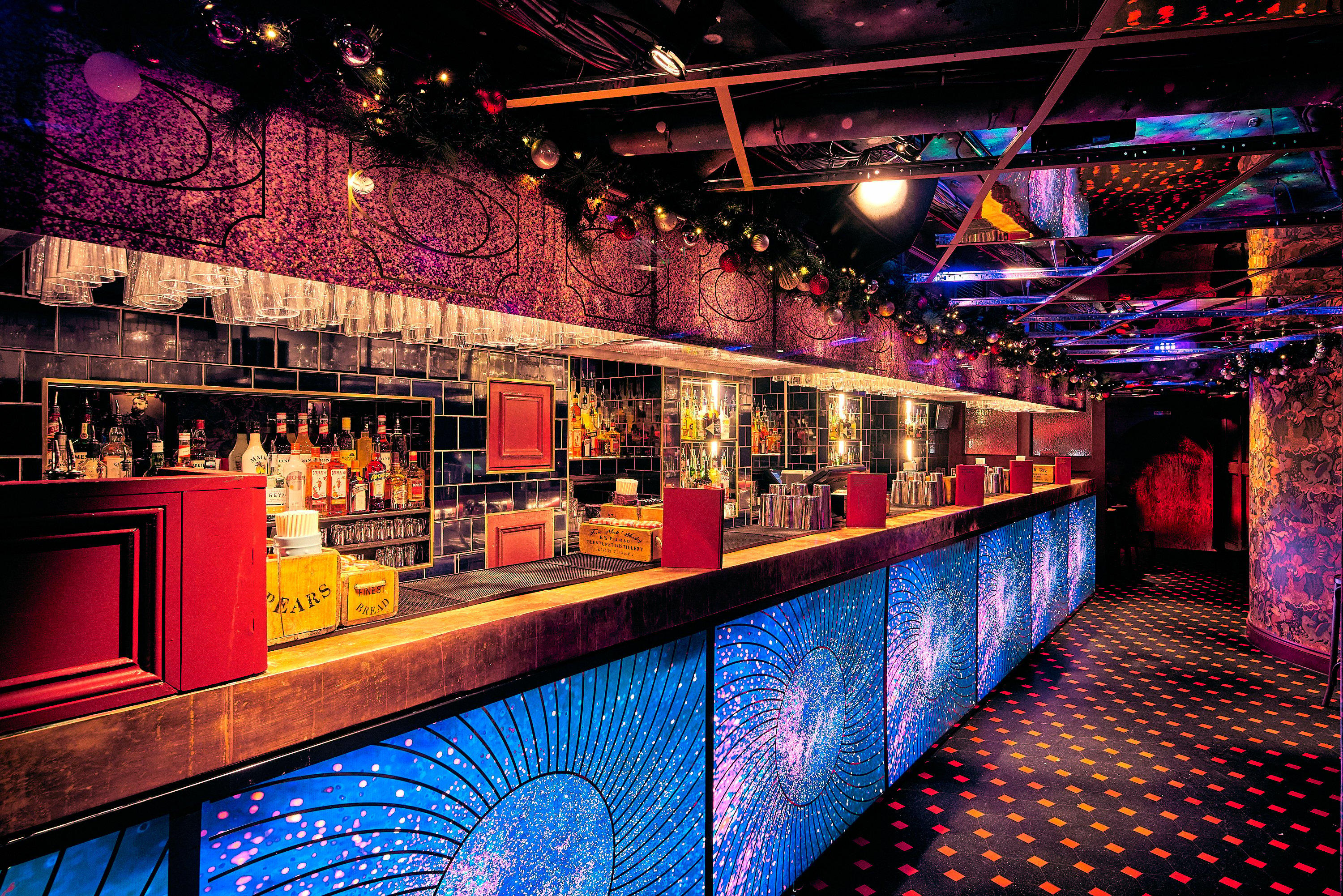 The bar decorated with Christmas decorations at The Escapologist