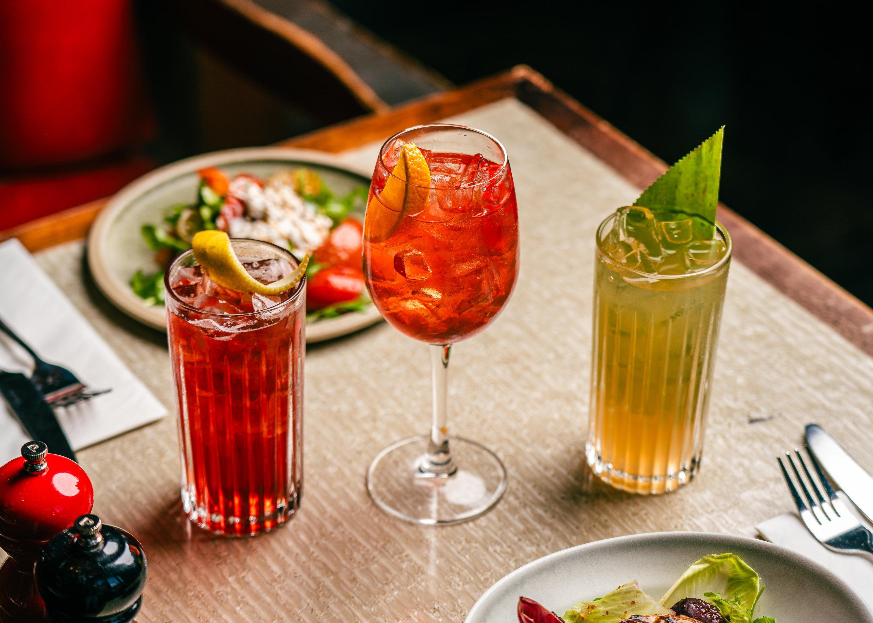 Three non-alcoholic cocktails on a table at Tuttons