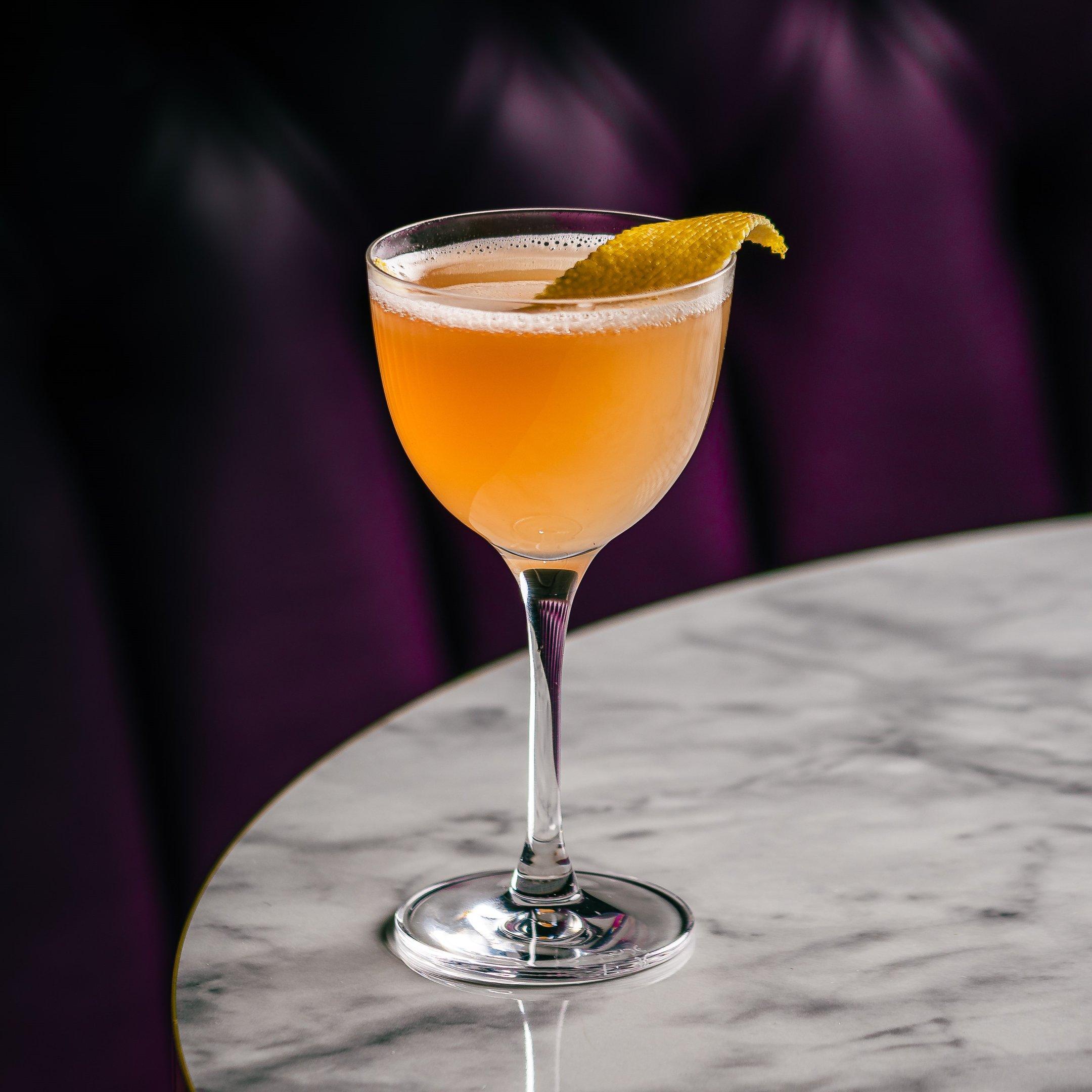 A shot of a alcohol free cocktail on a table at Dirty Martini