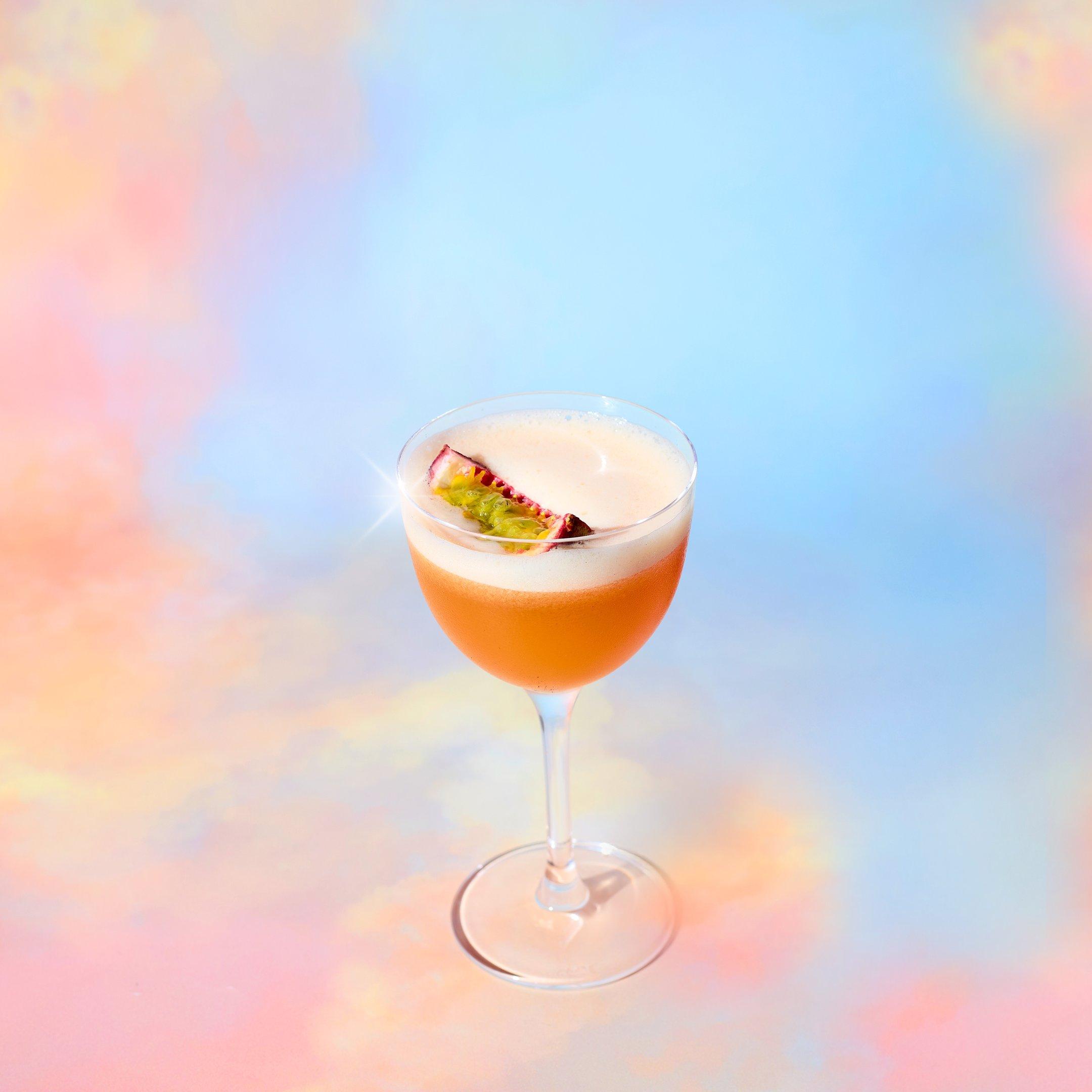 A Skinny B*tch 2.0 Tonight Josephine mocktail in front of a cloud background