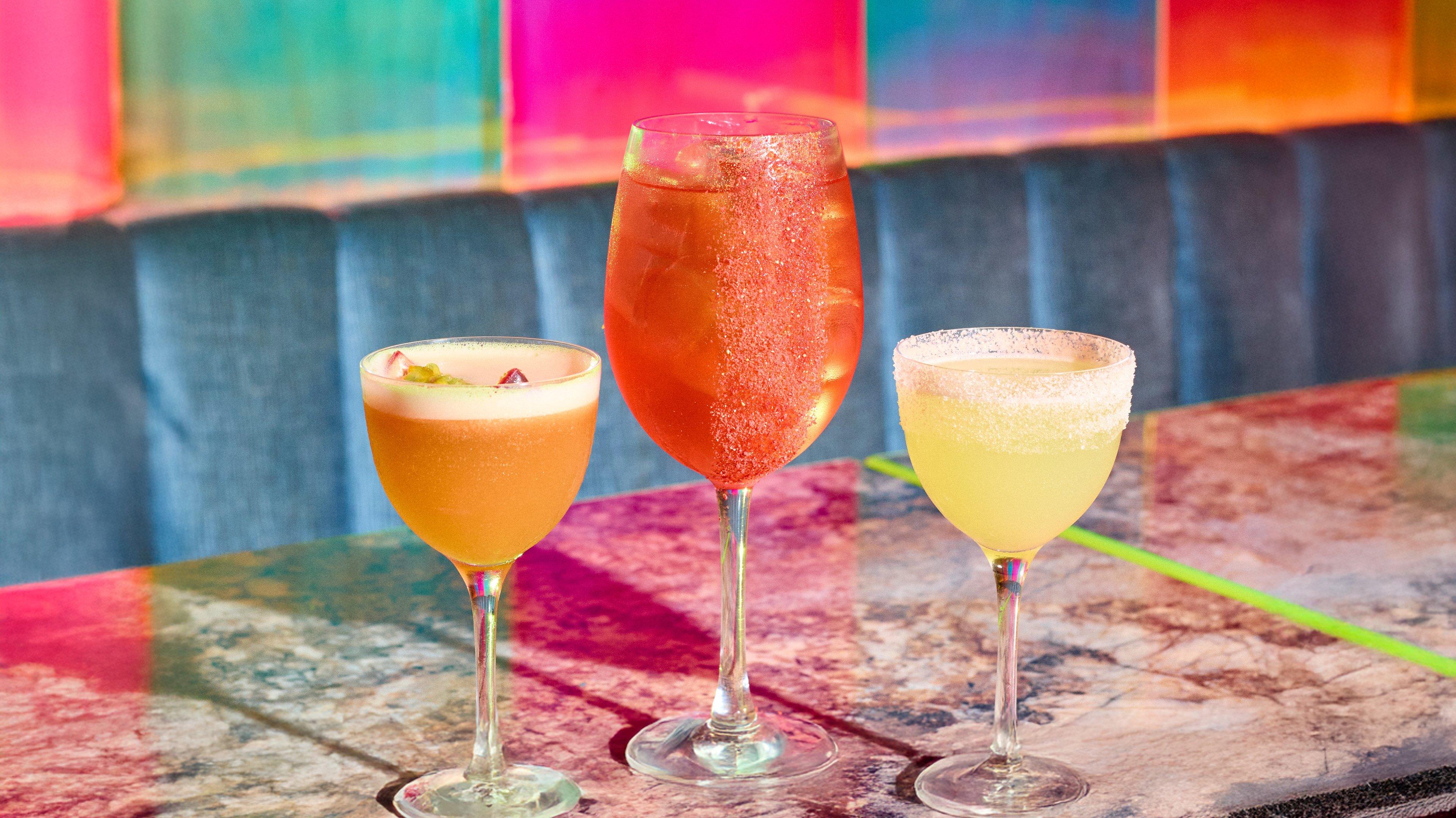 Three mocktails on a table at Nikki's bar