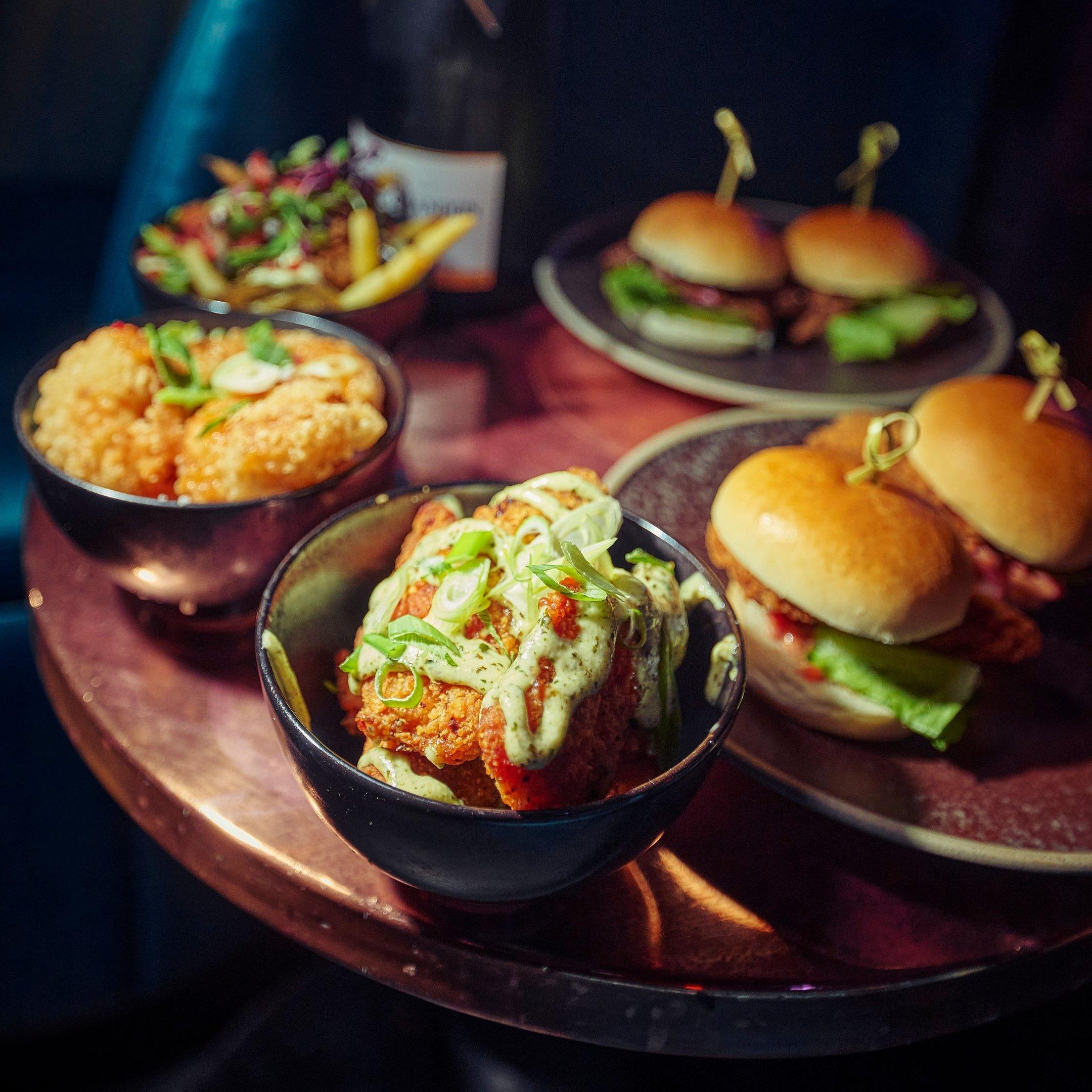 Small plates food on a table in Dirty Martini