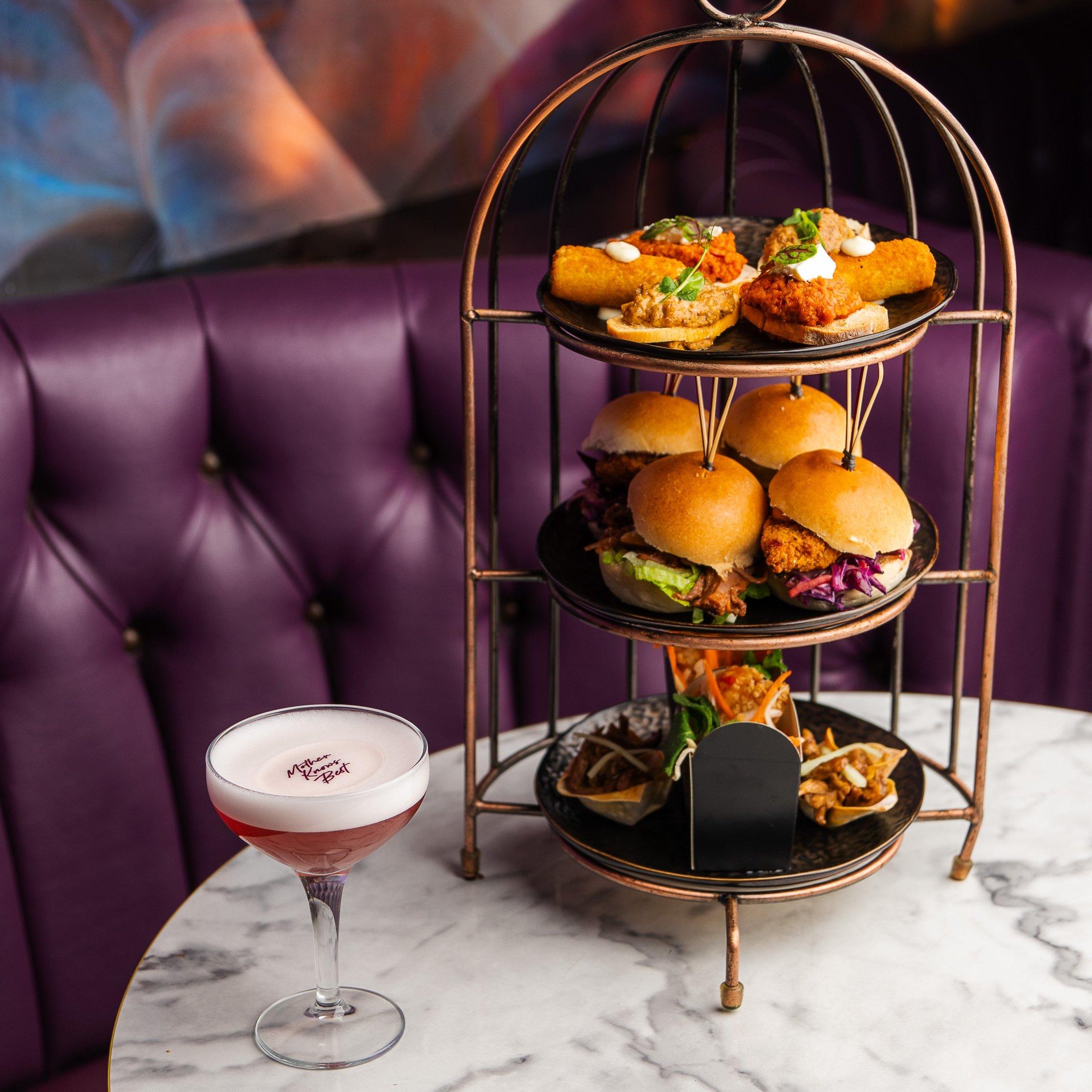 A bottomless brunch birdcage sharer with a Mother Knows Best cocktail