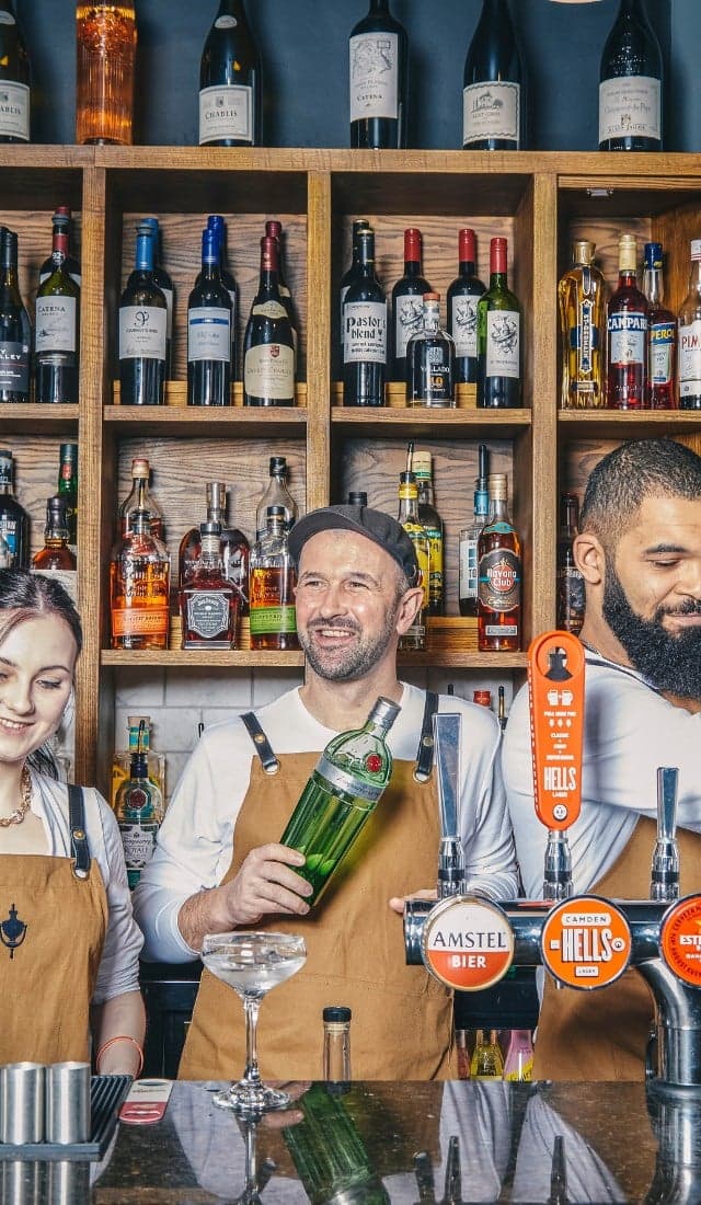 Bartenders making drinks
