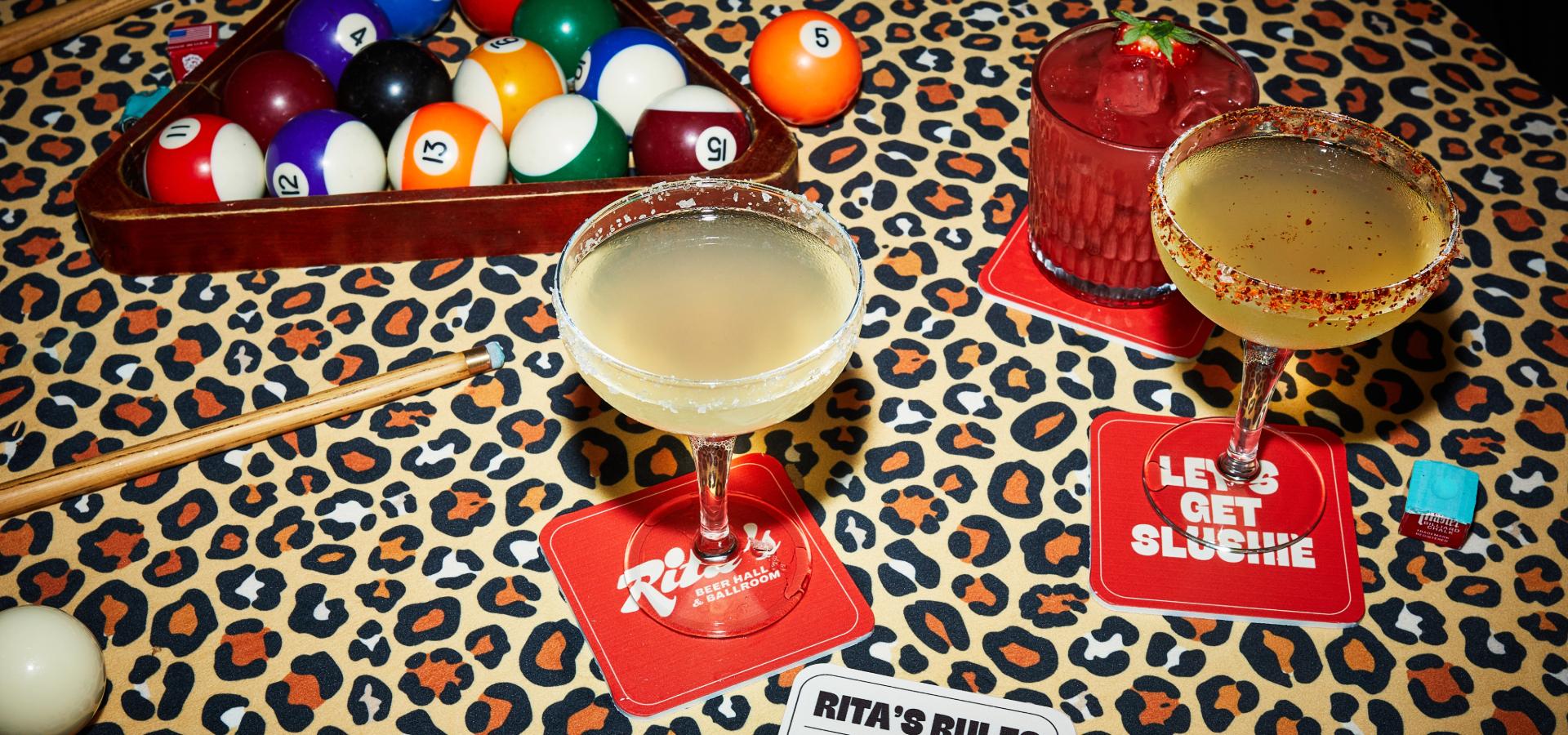 Rita's margs on leopard print pool table