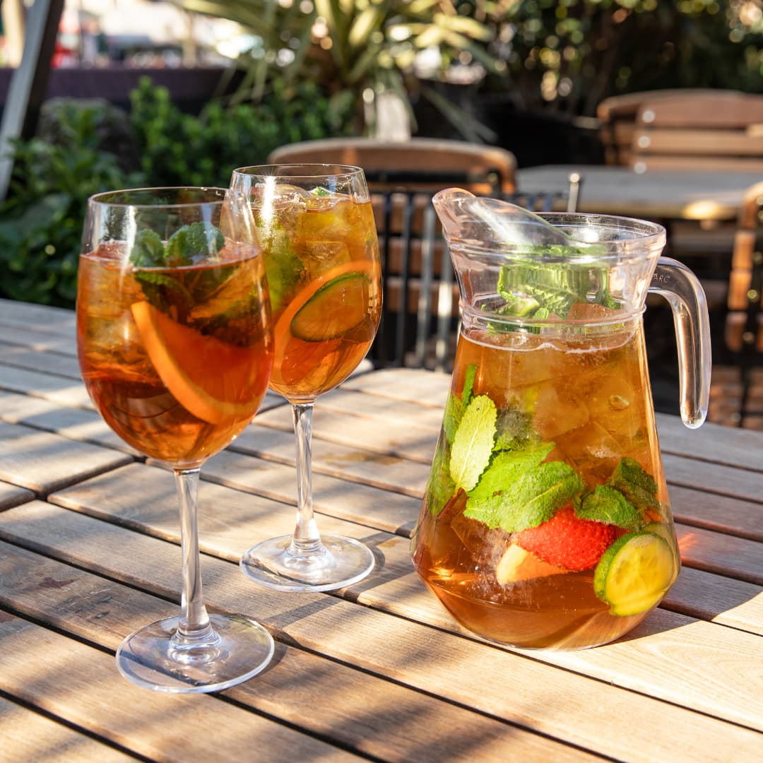 Pitcher and glasses of Pimm's cocktail