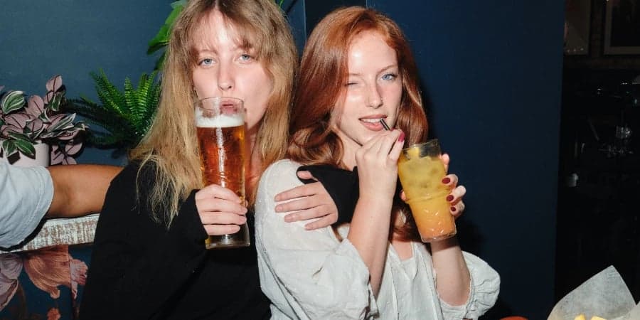 Students enjoying drinks at Slug & Lettuce