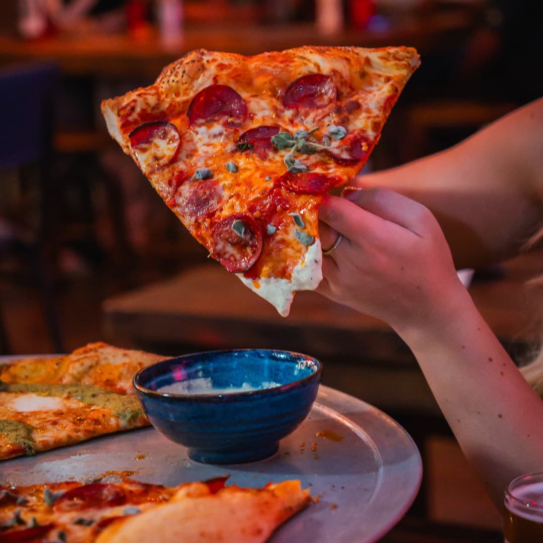 XL slice of pizza at Rita's