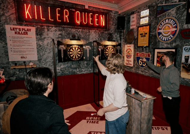 Man playing darts