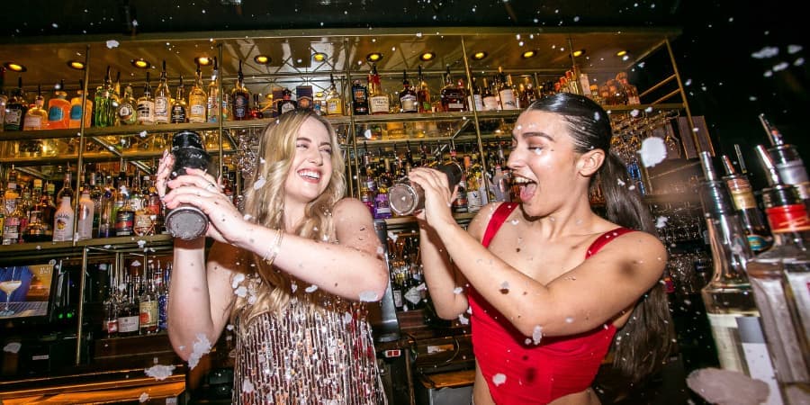 Girls taking a cocktail making masterclass
