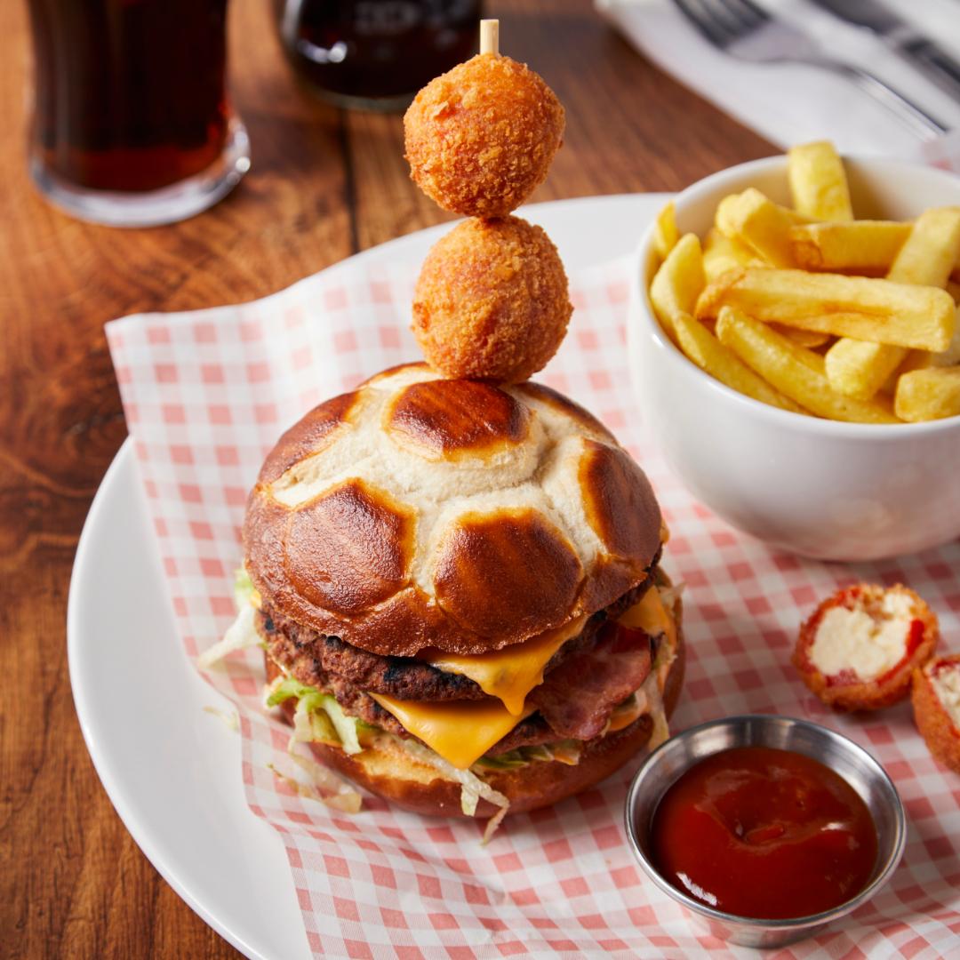 Triple Bacon Kick Euros Burger at Walkabout
