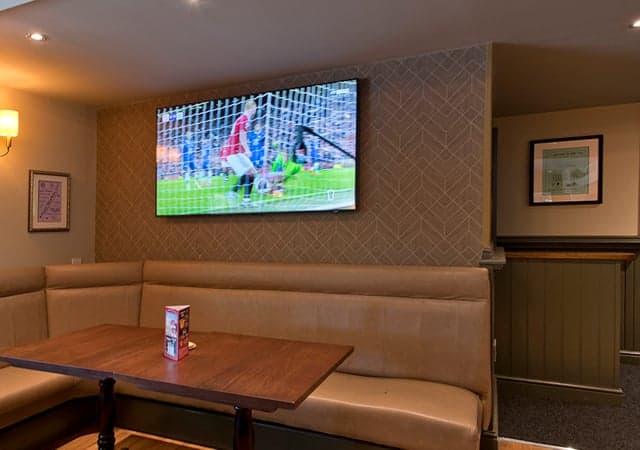 Booth with sport on the HD TV Screen