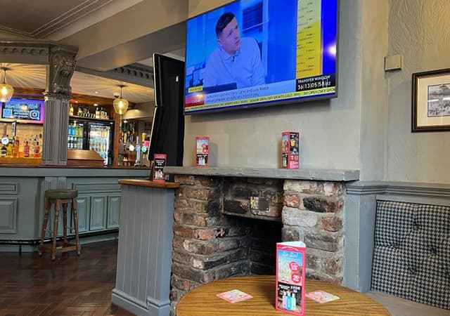 HD TVs showing Sky and TNT Sports