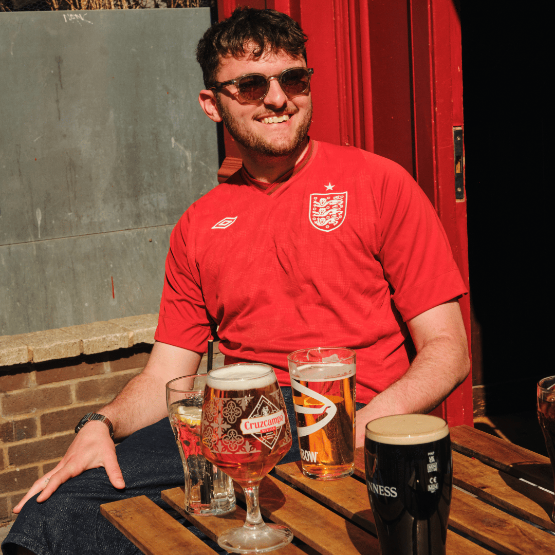 3 pints of peroni in a beer garden