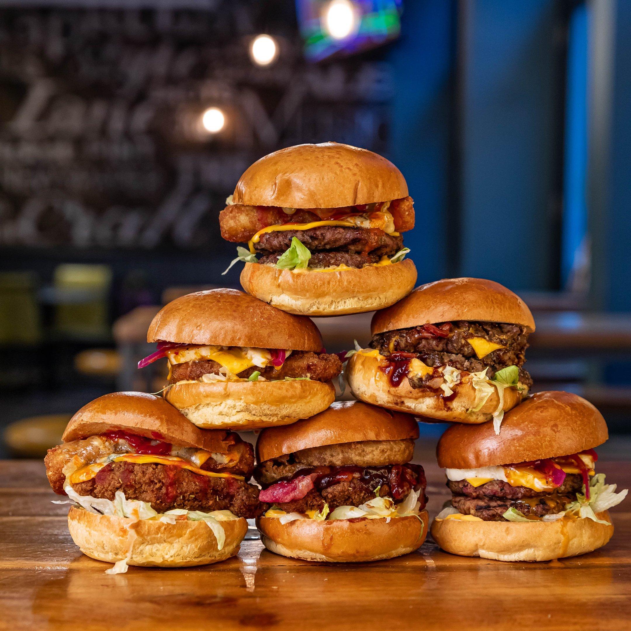 Stack of six juicy burgers