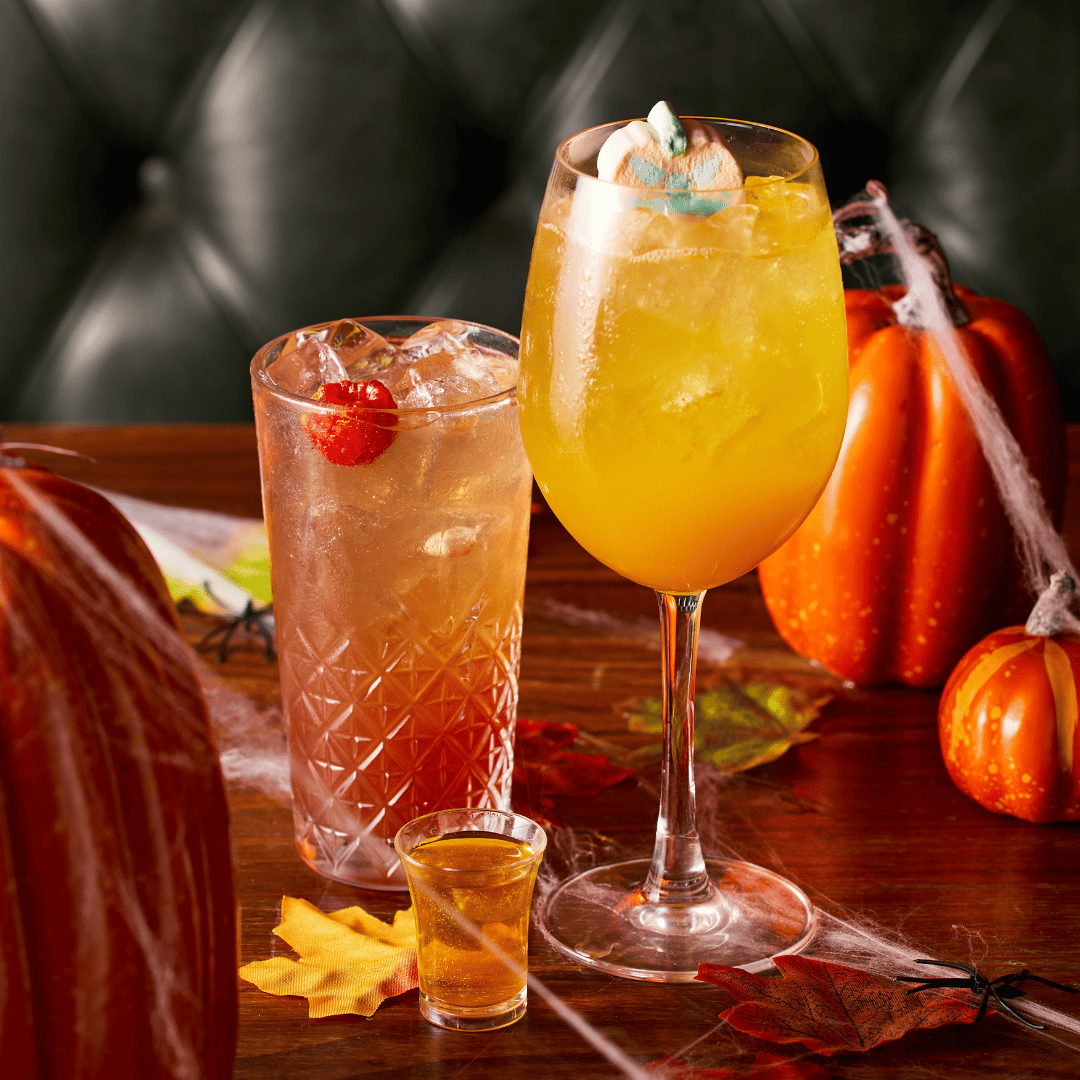 Two Halloween cocktails and shot