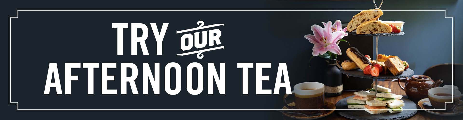 Try our afternoon tea, consisting of breads, cakes, strawberries and tea.