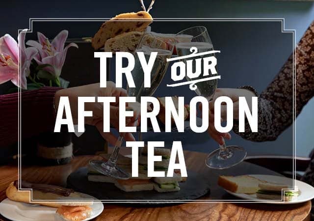 Try our afternoon tea, consisting of breads, cakes, strawberries and tea.