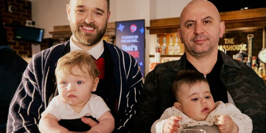 2 men with children