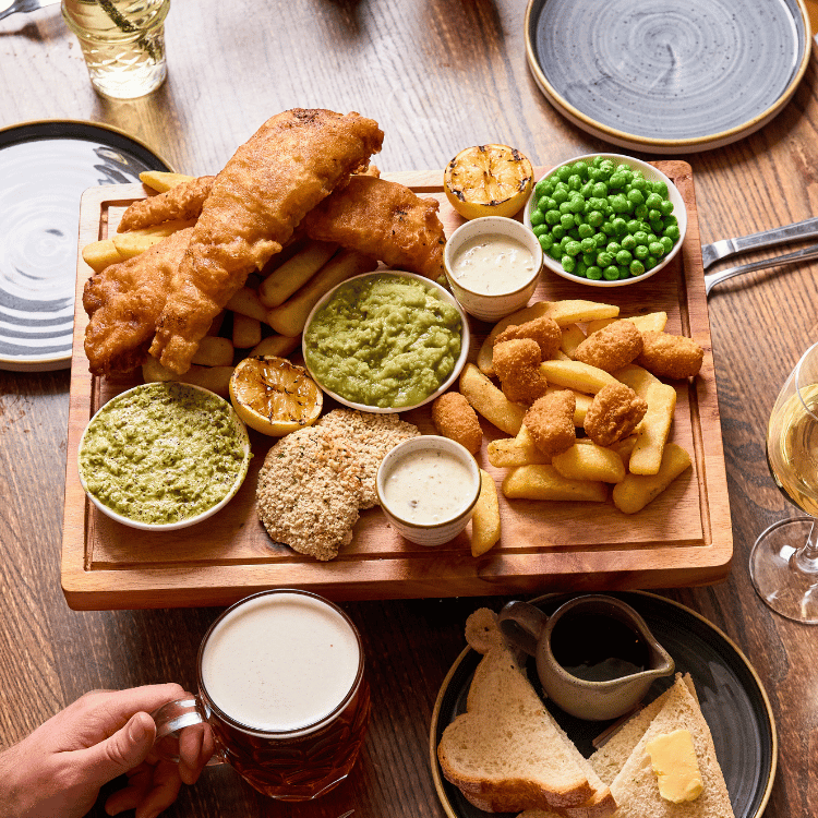 Family Sharing Fish Platter at Heritage Pubs