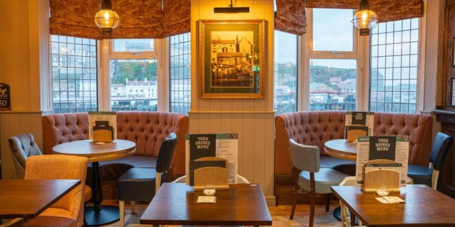 Customer dining area at Heritage Pubs