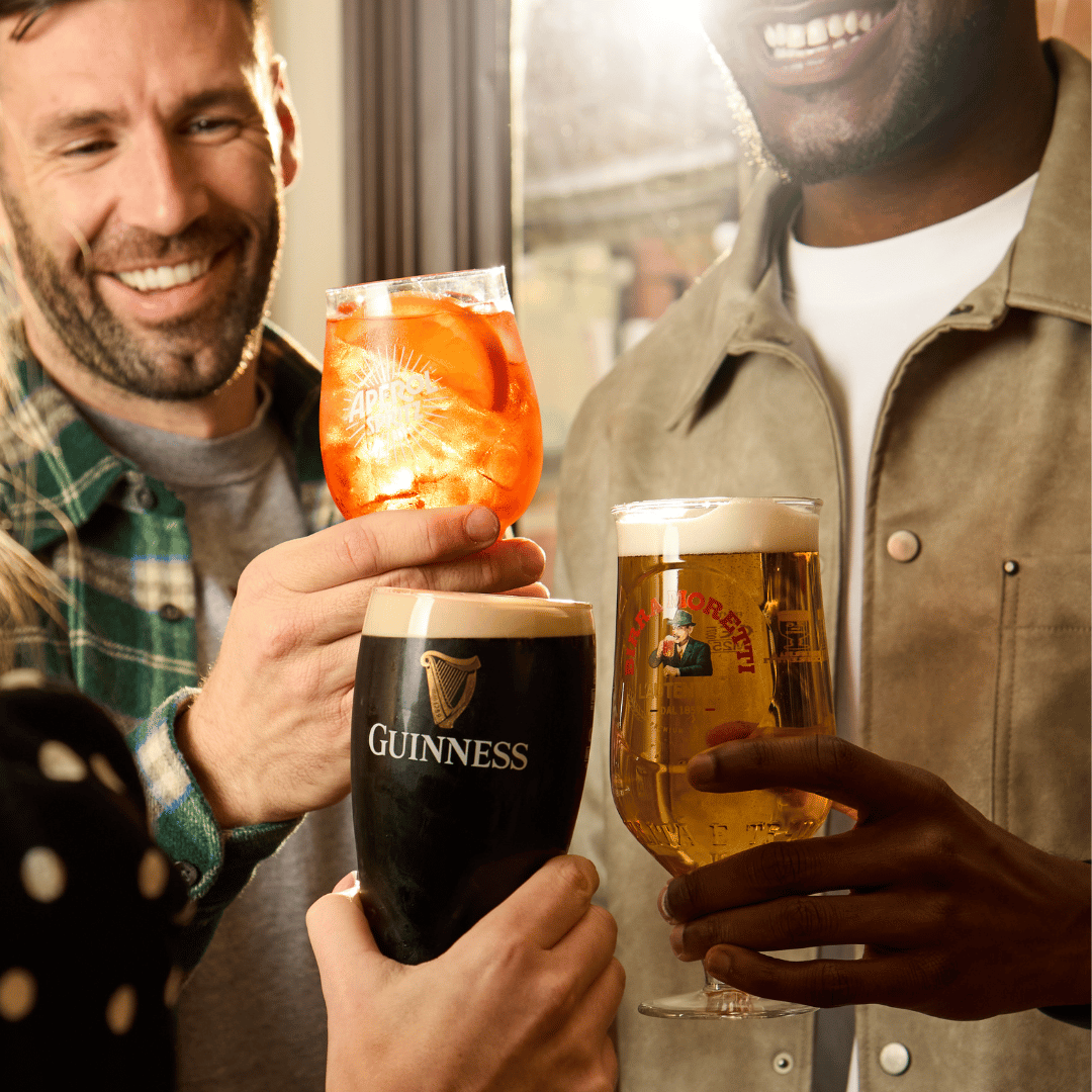 pint of guinness and two cocktails