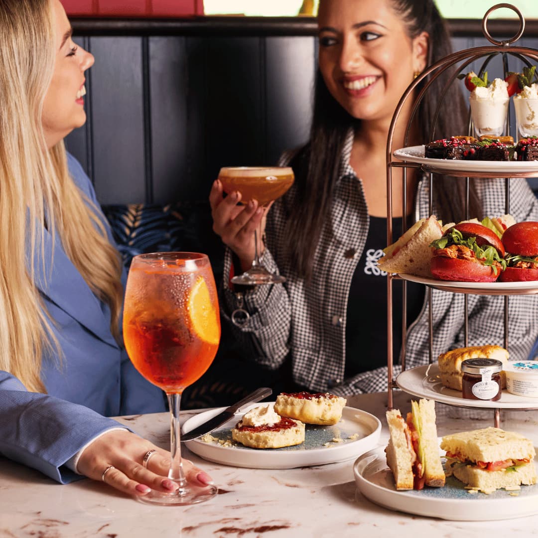 Girls enjoying 50% off cocktails in your local area