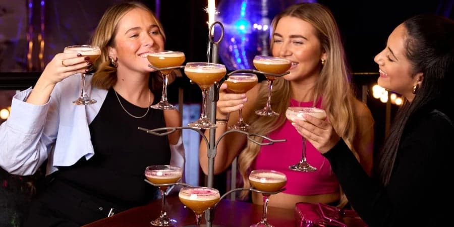 3 GIRLS ENJOYING A COCKTAIL TREE