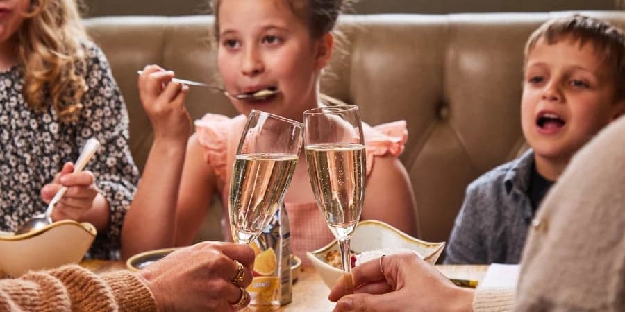 Prosecco while the kids eat
