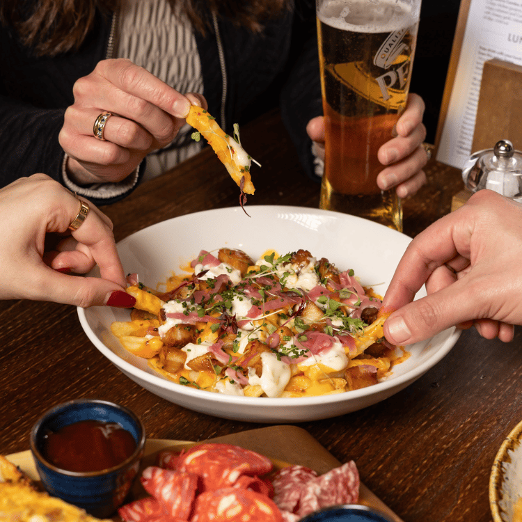 Sharing Food in Pubsmiths Beer Garden